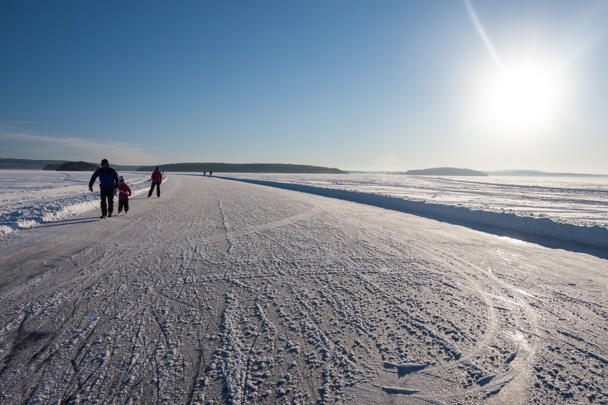 Ice skating on frozen lakes in Sweden