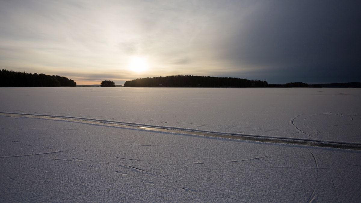 Ice skating on frozen lakes in Sweden