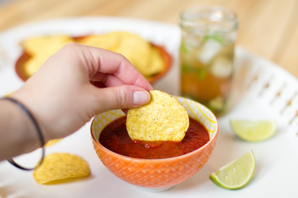 A blended salsa infused with garlic is the ultimate dip for your nacho chips.