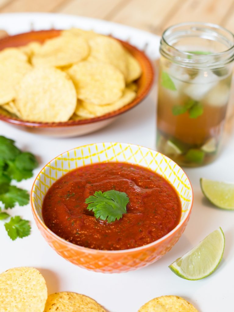 A blended salsa infused with garlic is the ultimate dip for your nacho chips.