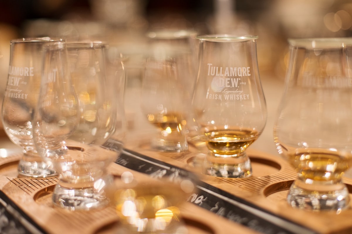 Whiskey glasses filled with samples.