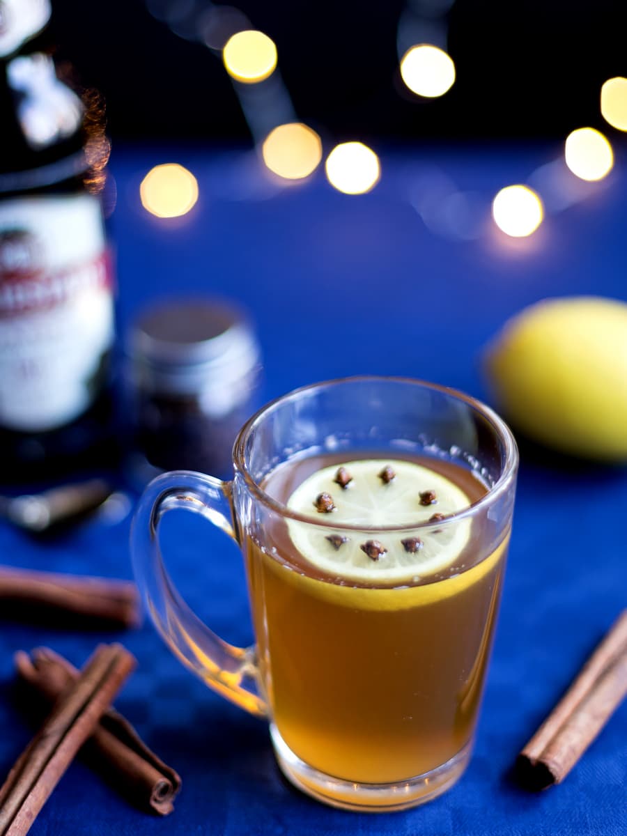 Polish mulled beer served in a see-through mug.