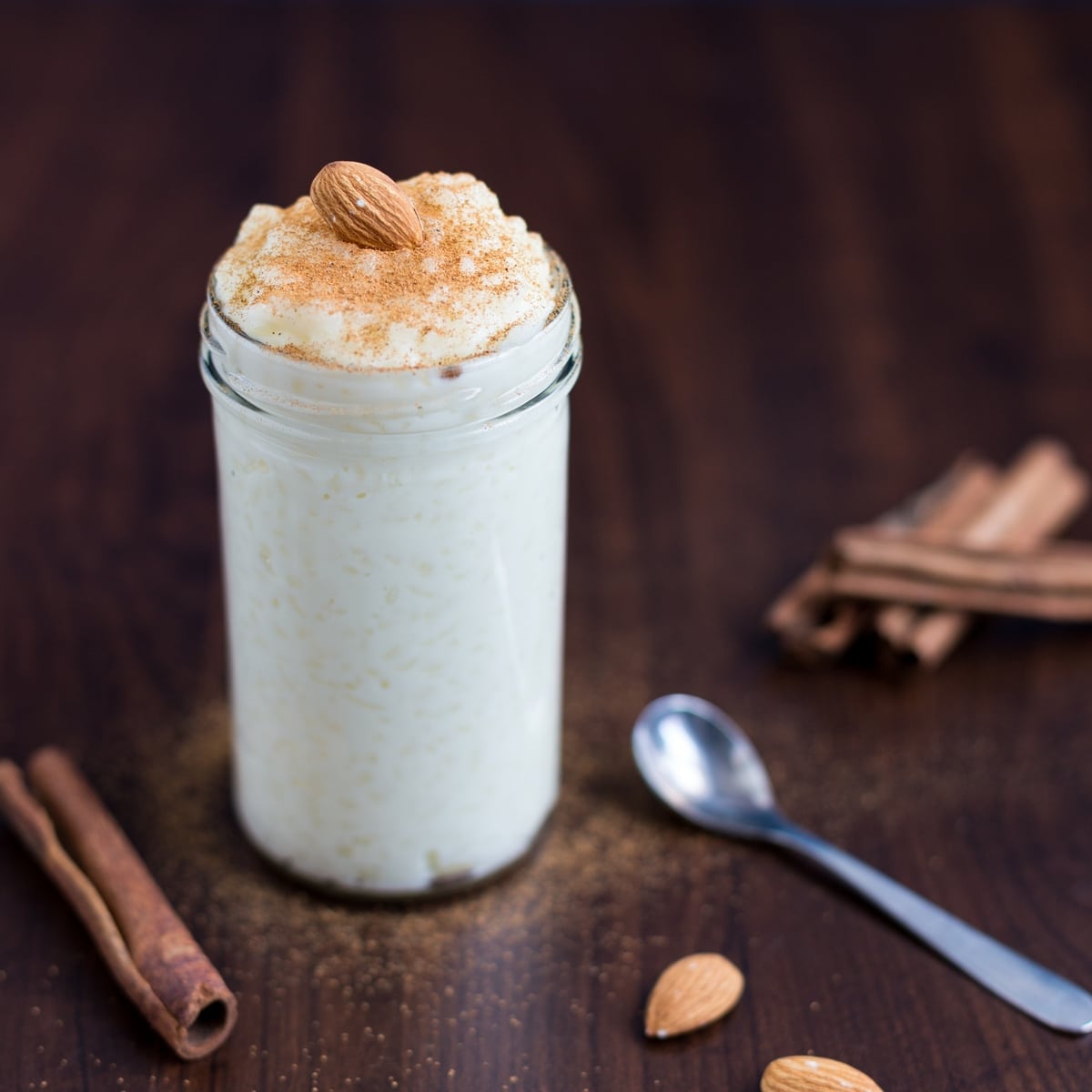A serving of traditional Christmas rice porridge with a whole almond on top.