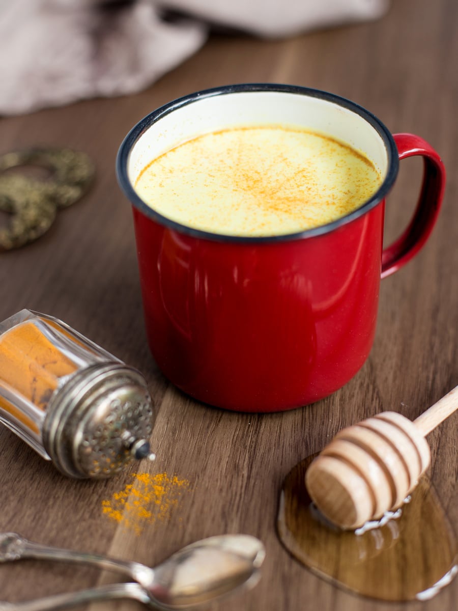 Hot honey rum milk with turmeric powder. 