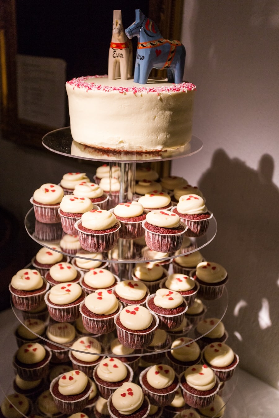 My wedding reception: the wedding cake made of red velvet cupcakes with dala horses on top