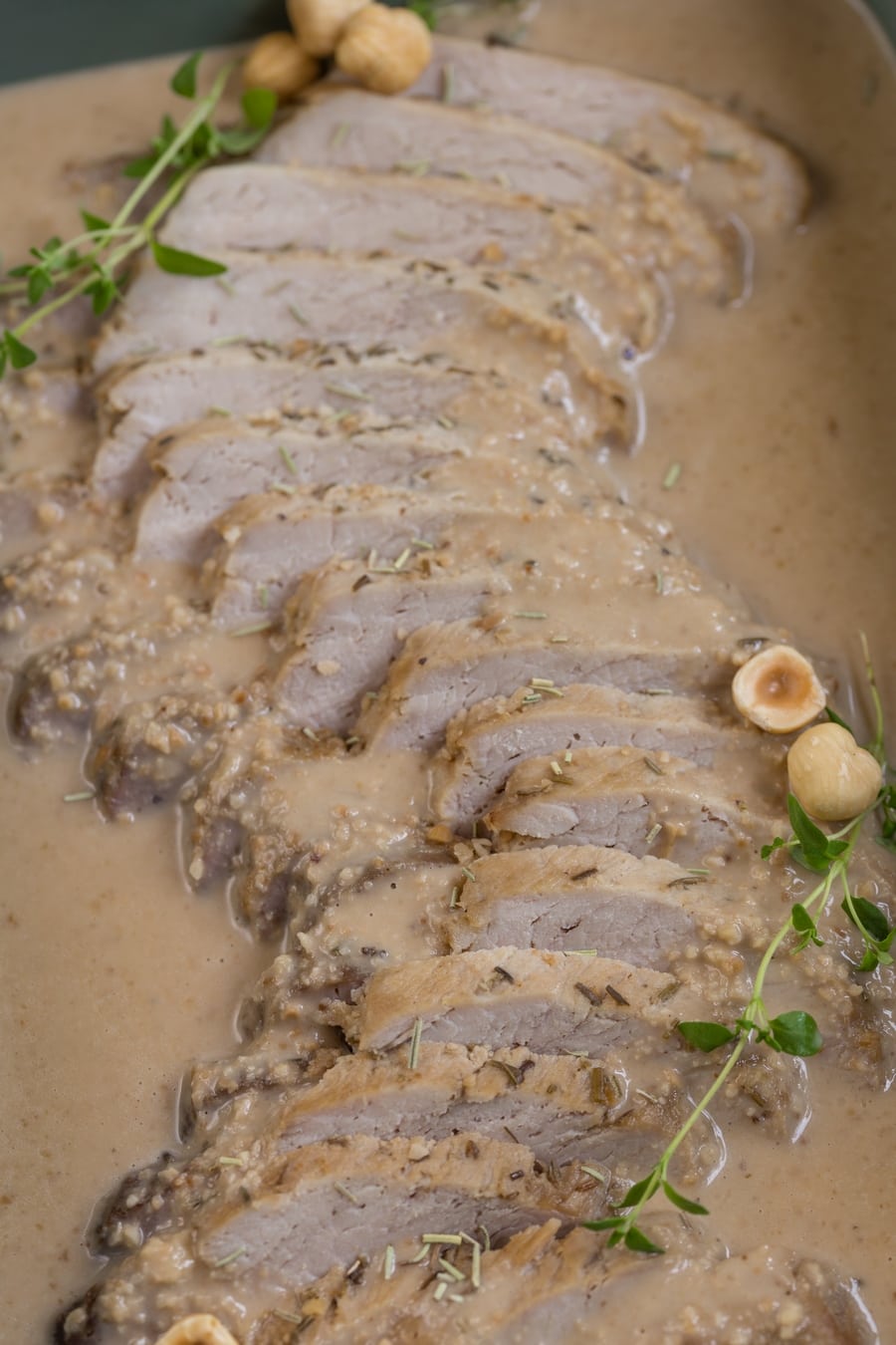 Baked pork loin in hazelnut gravy.