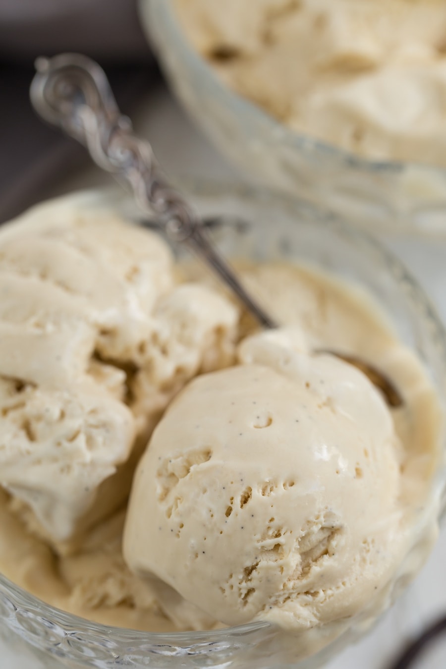 Close up of London fog ice cream in a glass bowl, two balls.