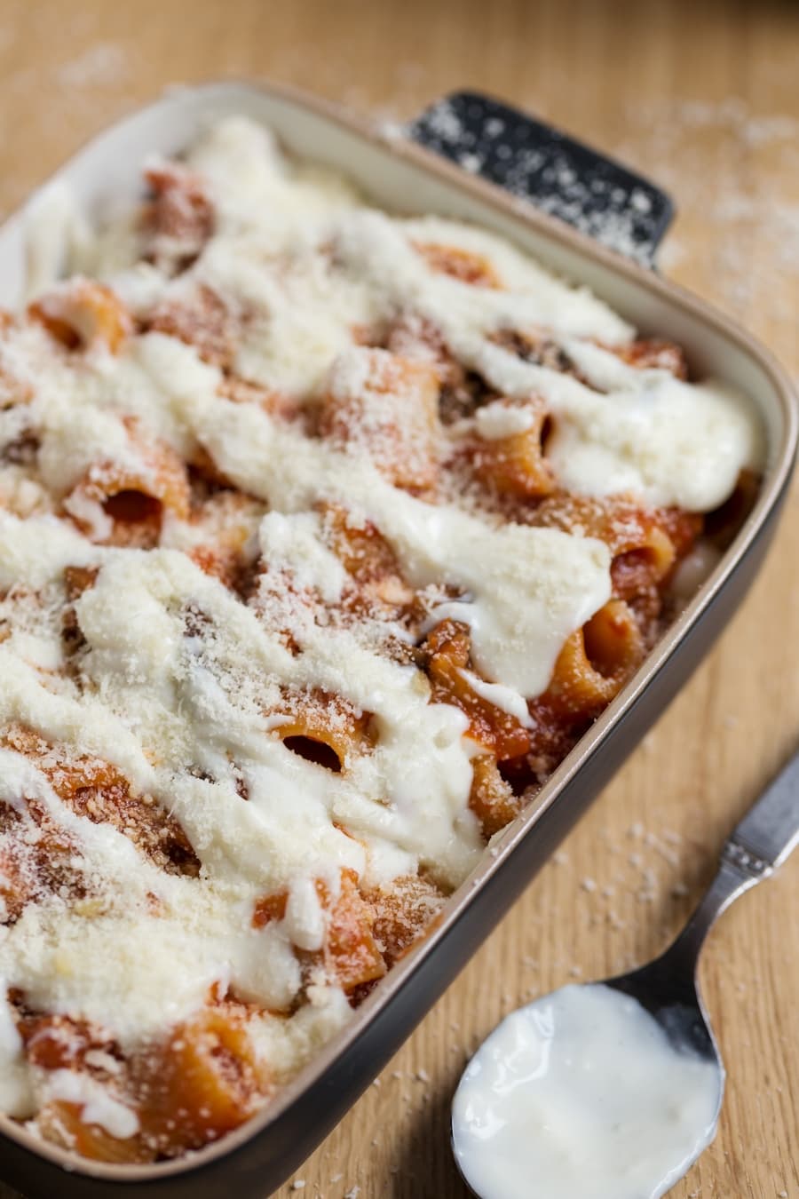 Uncooked eggplant pasta bake in casserole.