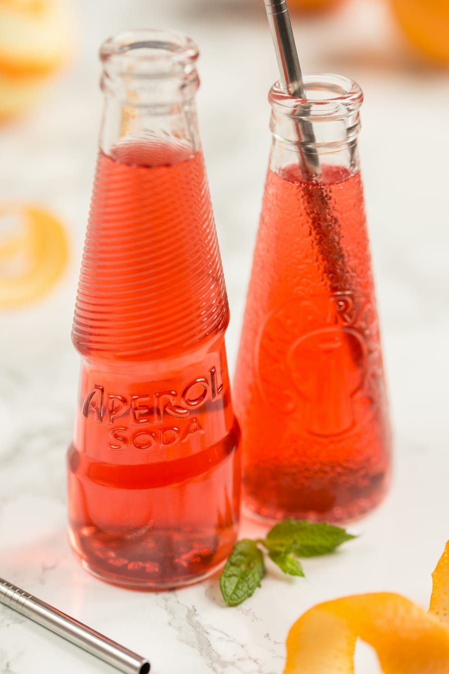 Aperol soda bottle.