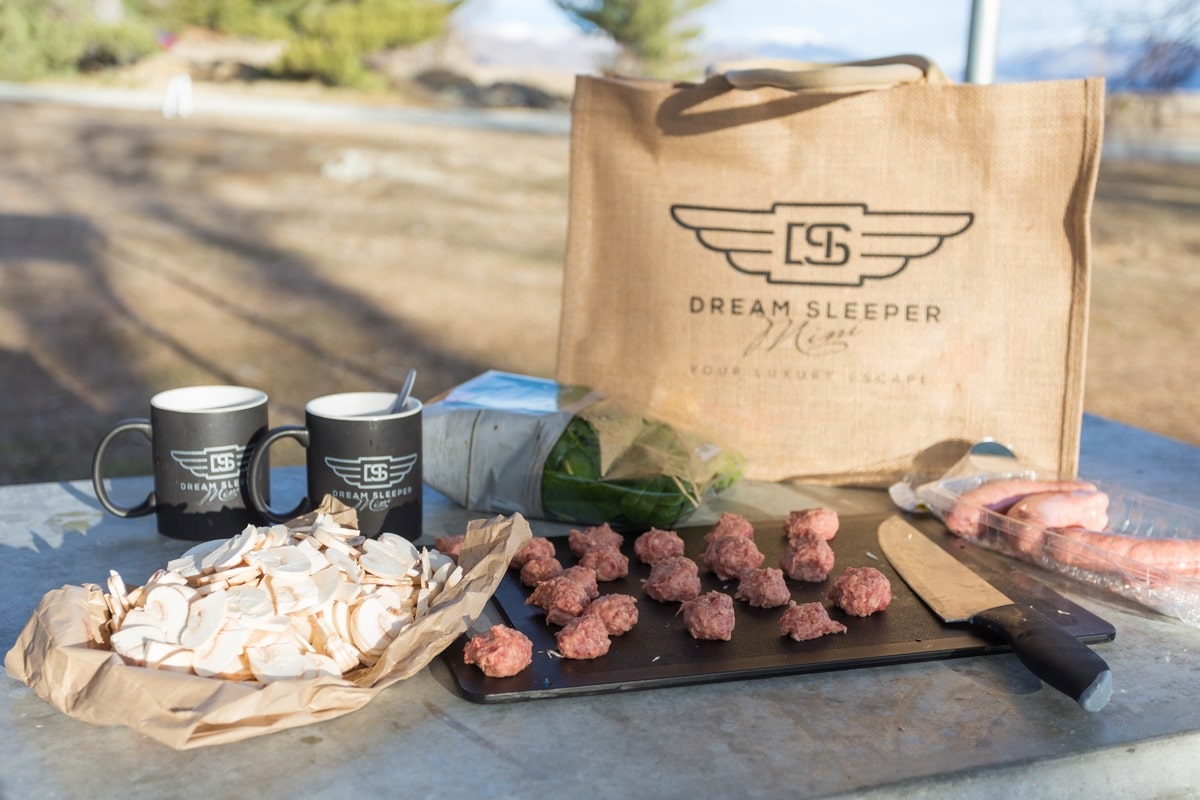 Dream Sleeper Mini campervan kitchen amenities and food.