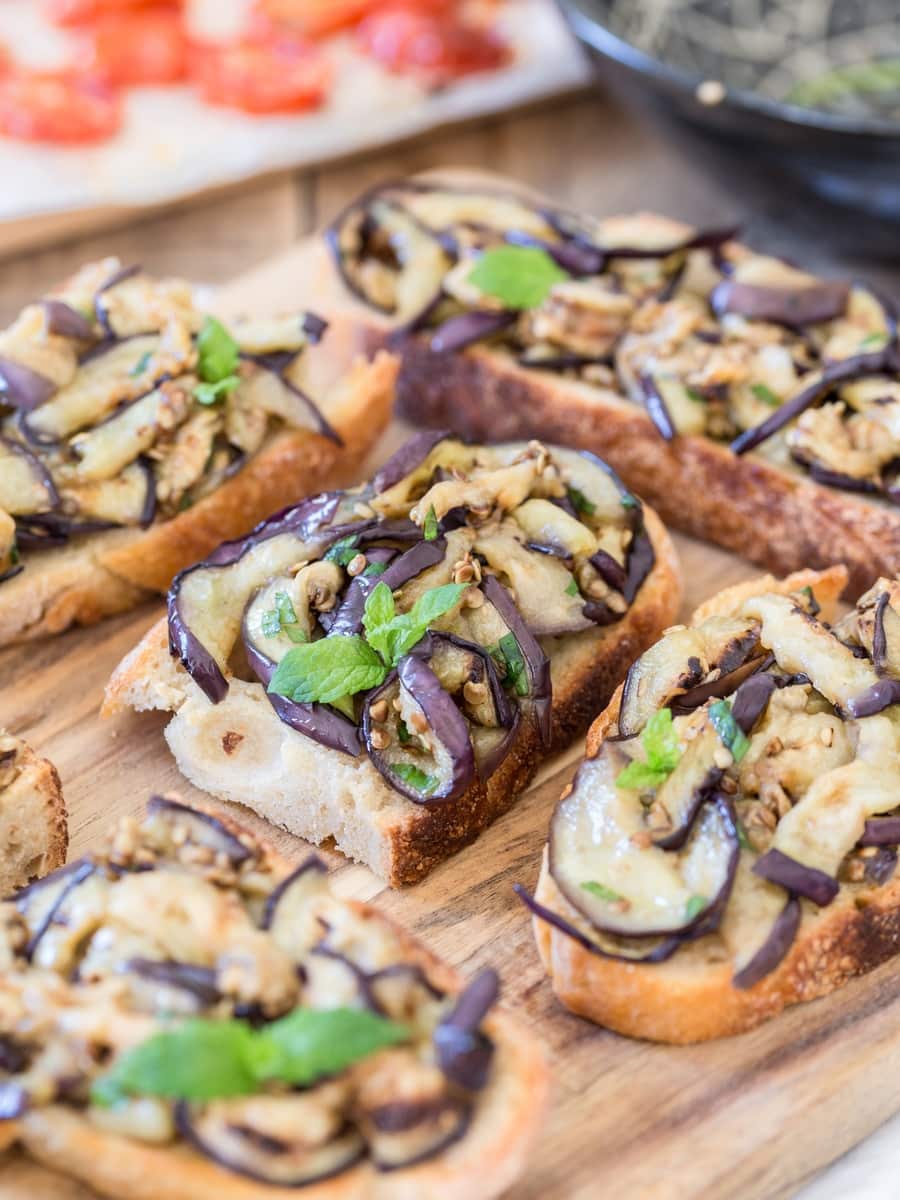Grilled eggplant bruschetta on sourdough bread.