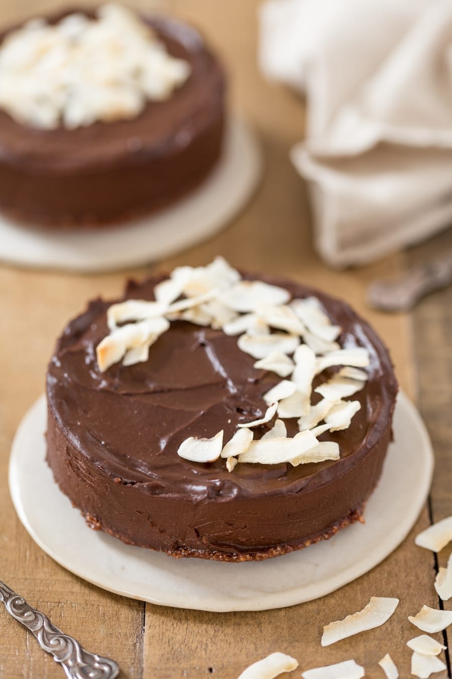Closeup of no-bake vegan chocolate cake with date syrup.