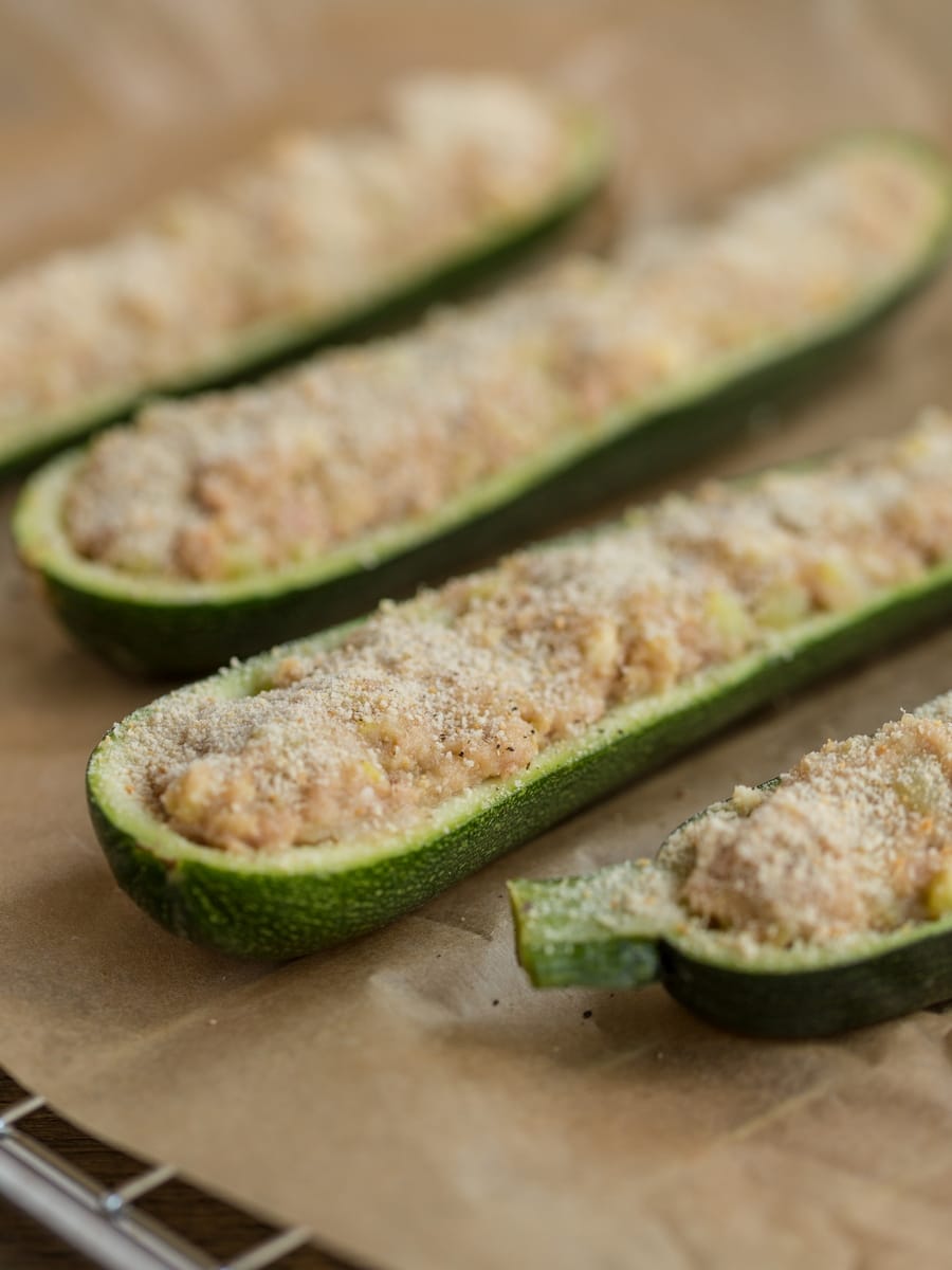 Unbaked stuffed zucchini boats.