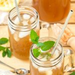 Brown sugar lemonade with a fresh mint sprig in the glass.