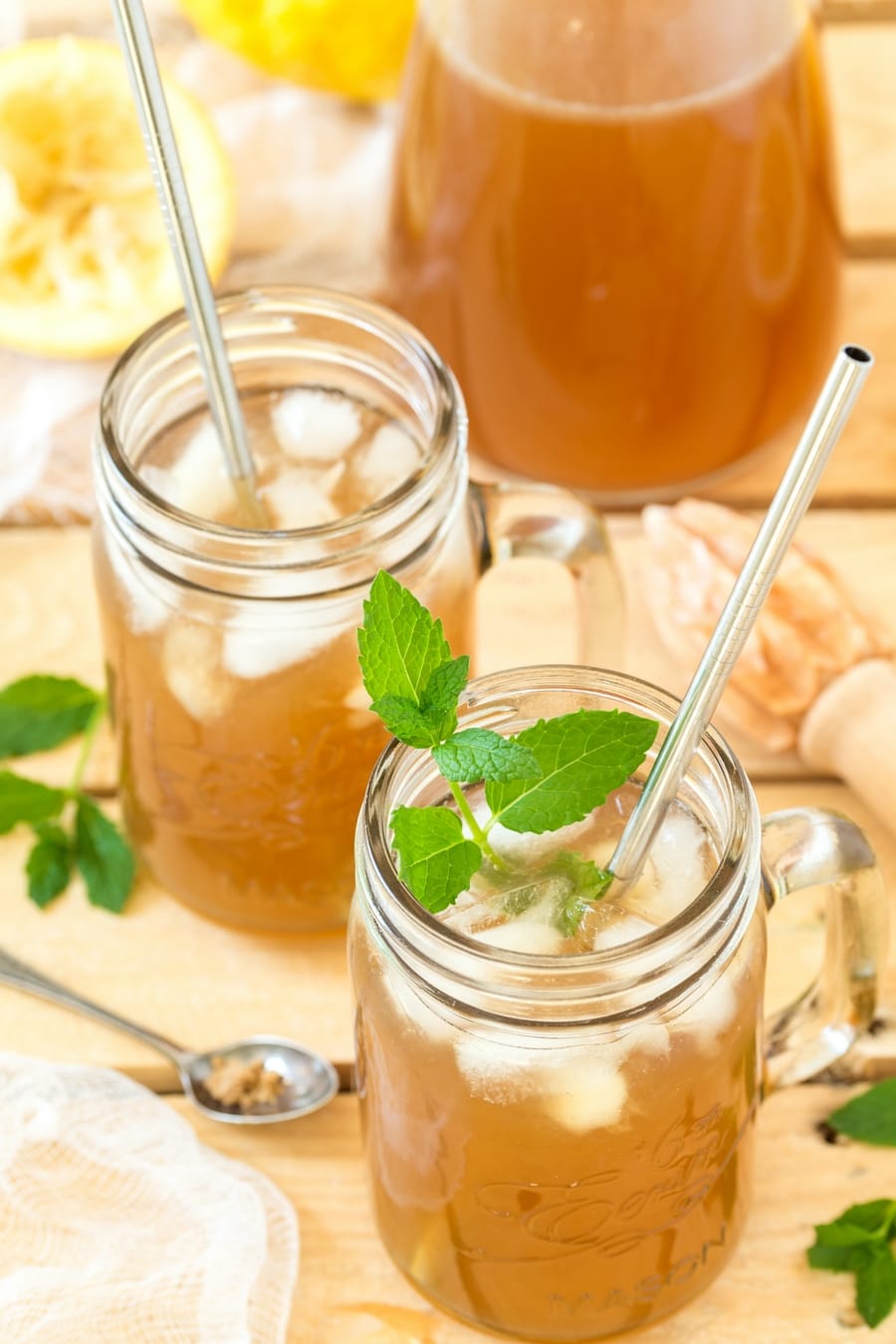 Brown sugar lemonade with a fresh mint sprig in the glass.