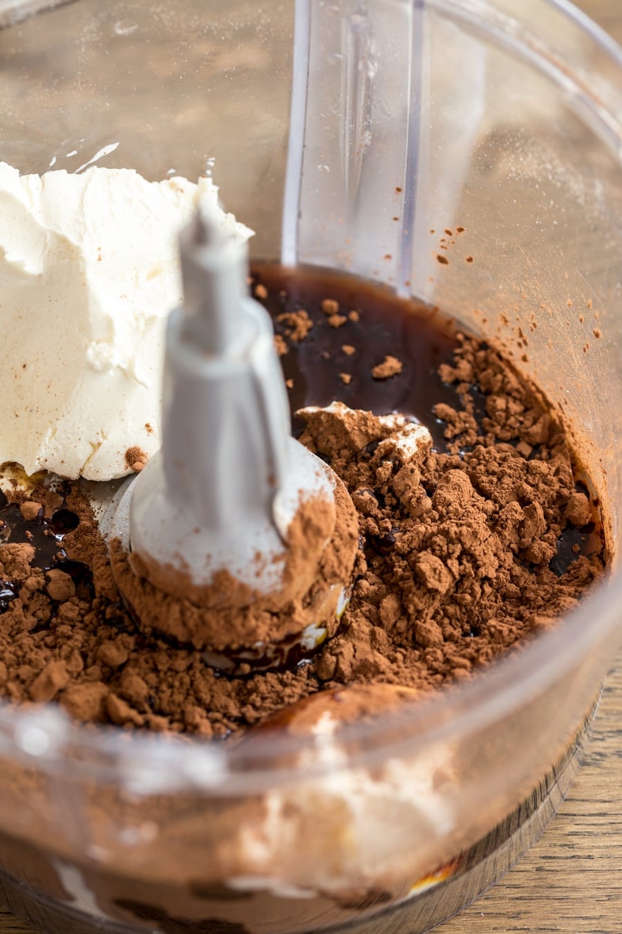 Mascarpone, daye syrup and cocoa powderin a food processor.