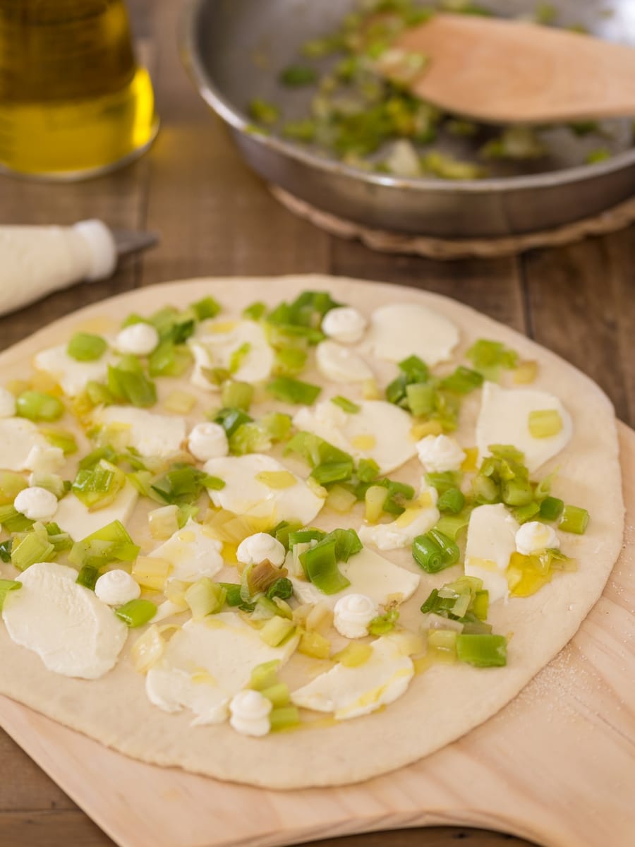 Leek mascarpone pizza bianca unbaked, just before going into the oven.
