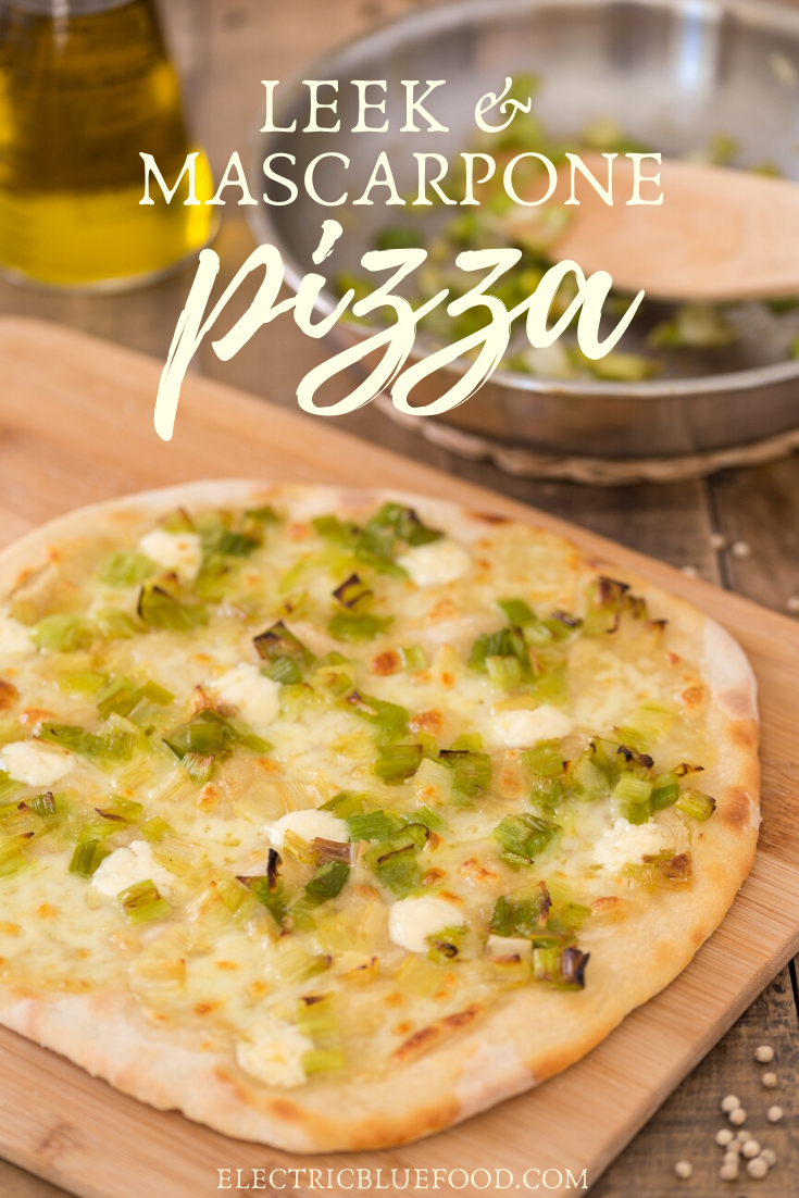 Leek mascarpone pizza bianca: an unusual pizza topping for a delicious homemade pizza. No tomato sauce but good olive oil and puddles of melted mascarpone cheese that perfectly pair with sautéed leeks with white pepper.