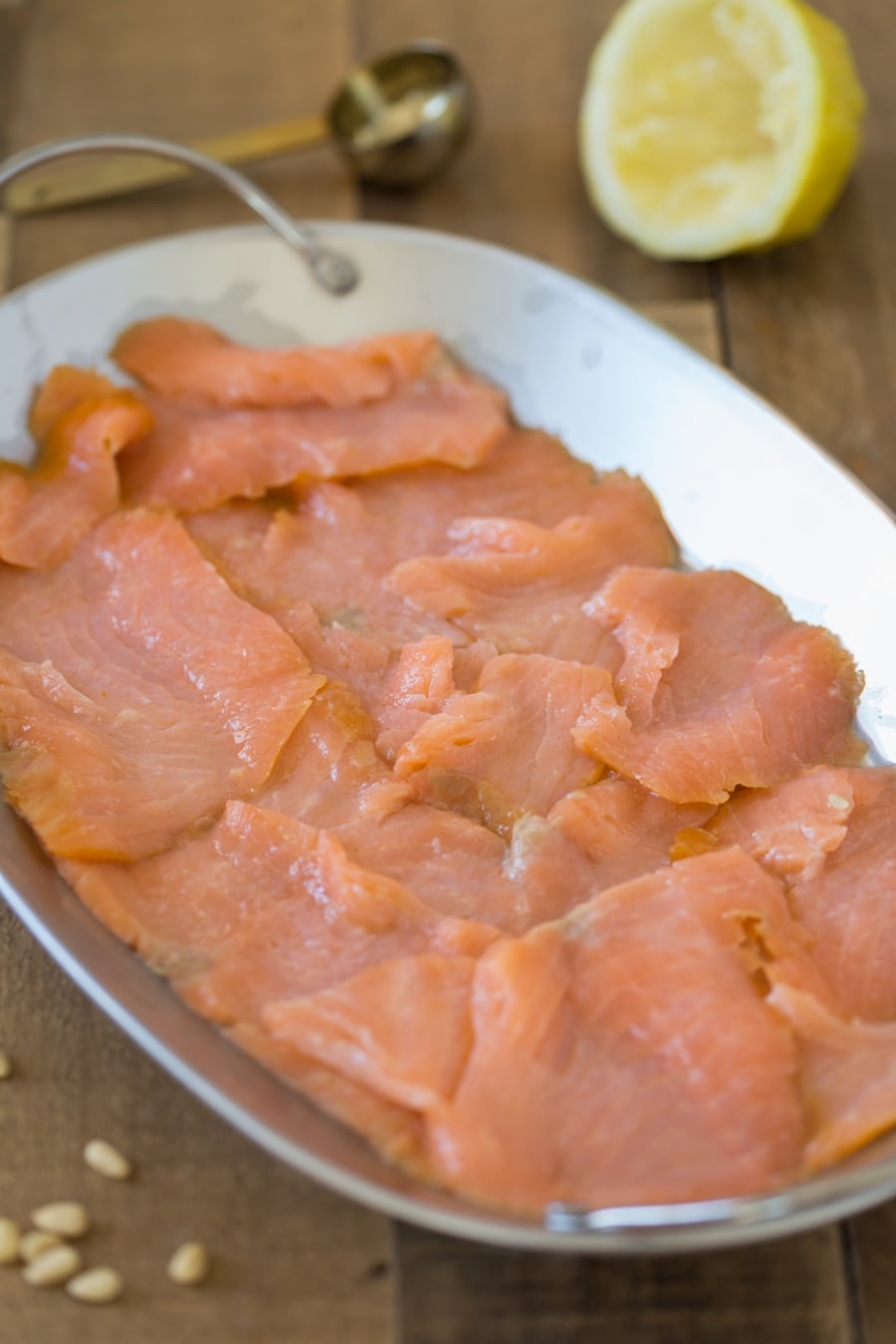 Smoked salmon marinated in lemon juice.