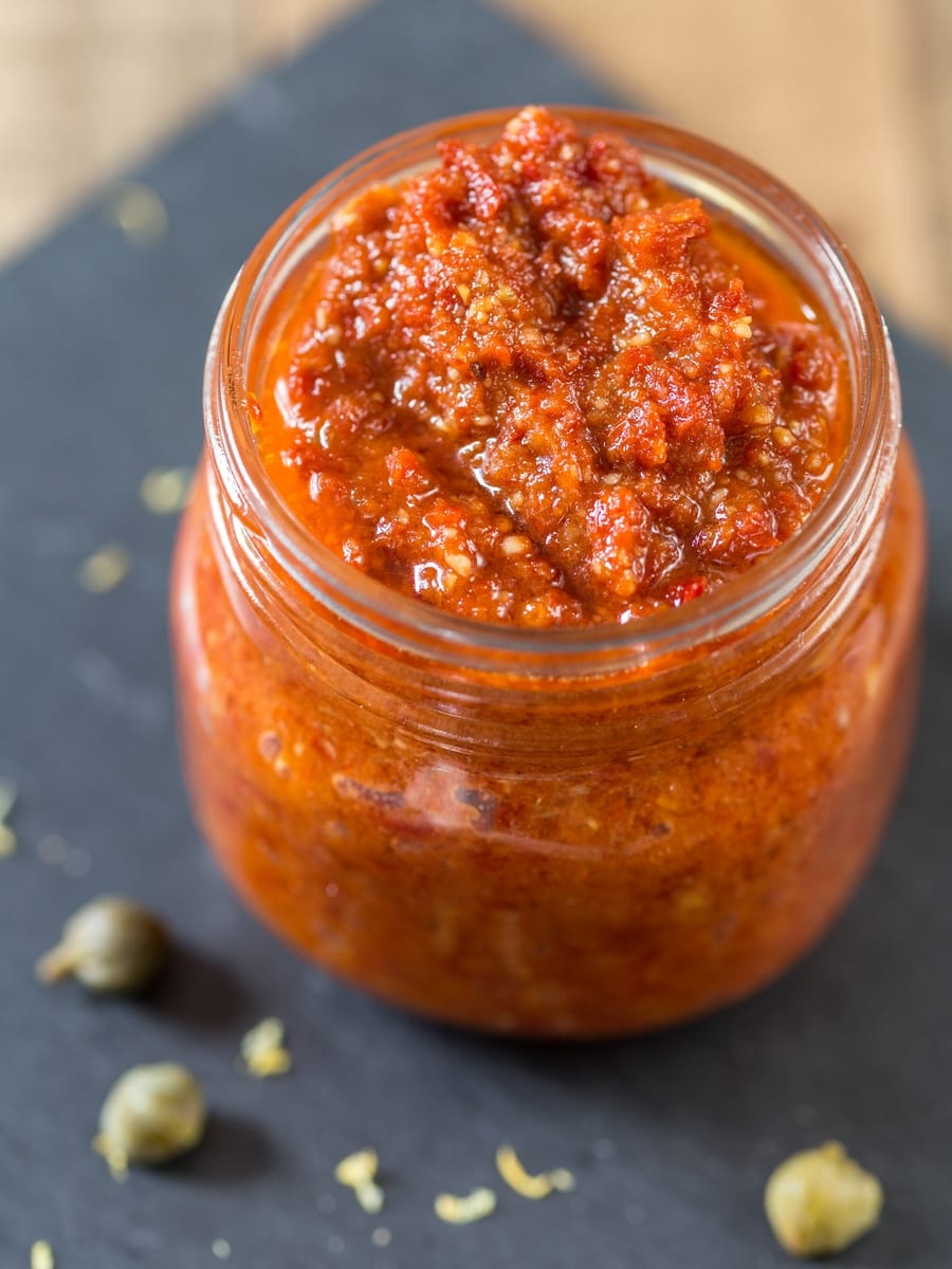 Vegan sun-dried tomato pesto in a jar.