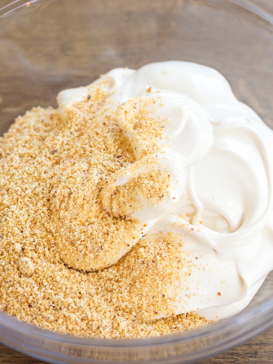 Hazelnut meal added to whipped egg whites and honey.