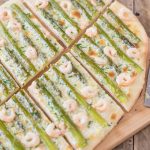 Shrimp asparagus flatbread with zesty mascarpone sauce.