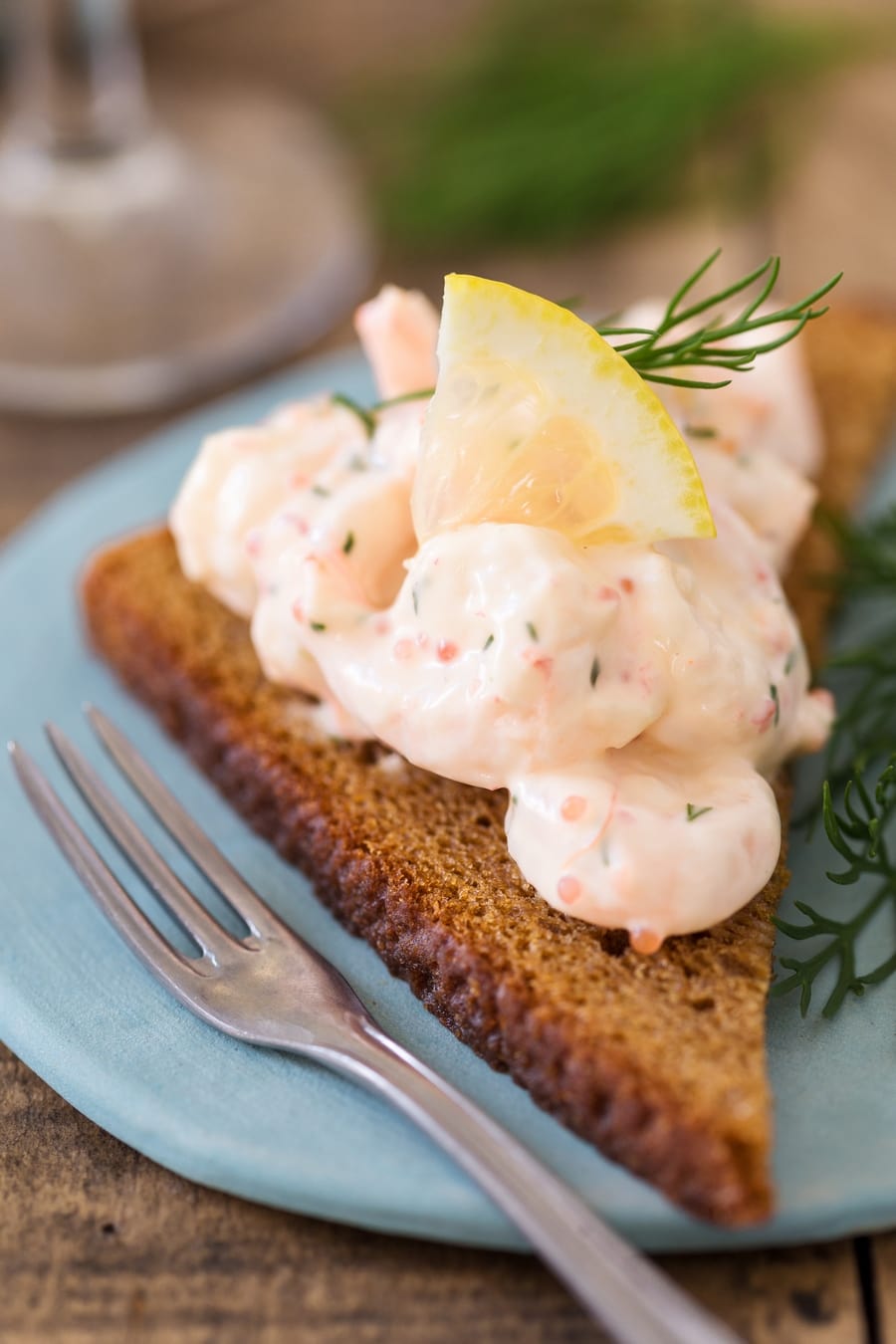 Toast skagen rye bread with skagenröra shrimp salad topping.