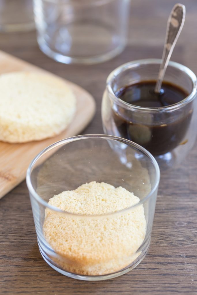 Tiramisu in a glass procedure: add the sponge cake to a glass.