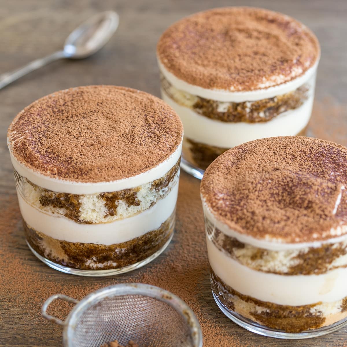 Tiramisu in a glass made with sponge cake and mascarpone cream.