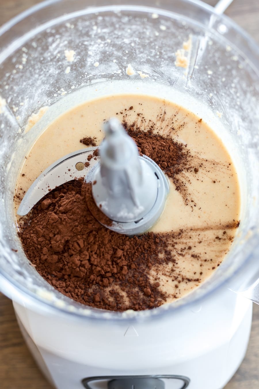 Cocoa powder is added to hazelnut paste.