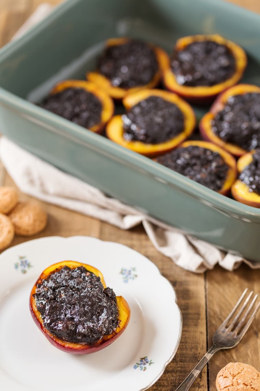 Baked peaches with amaretti filling serving.