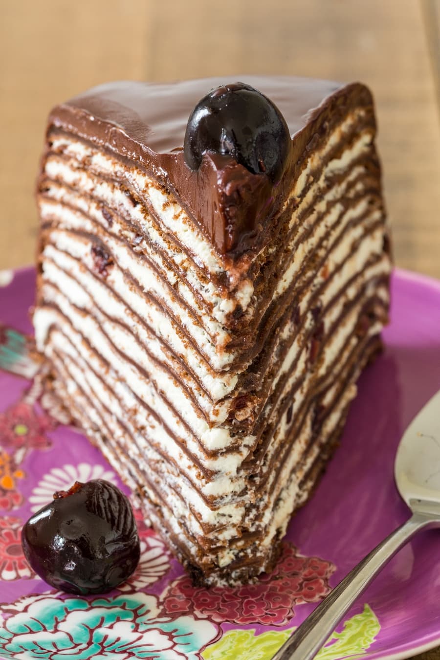 Slice of Black forest crepe cake.