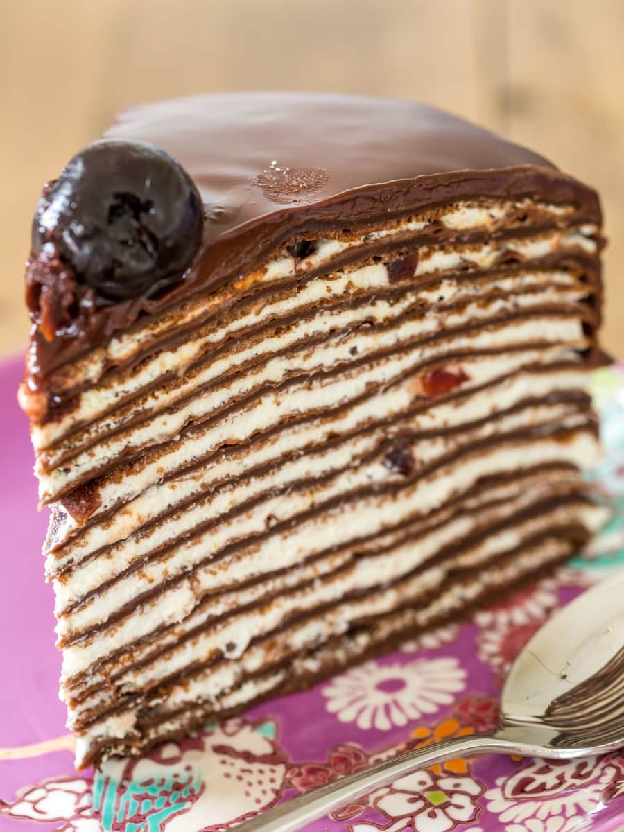 Slice of Black forest crepe cake.