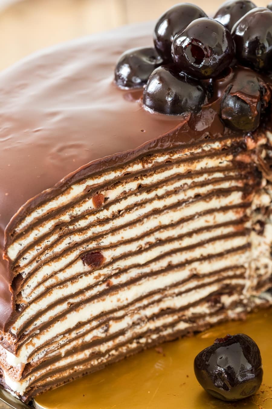 Slice of Black forest crepe cake.