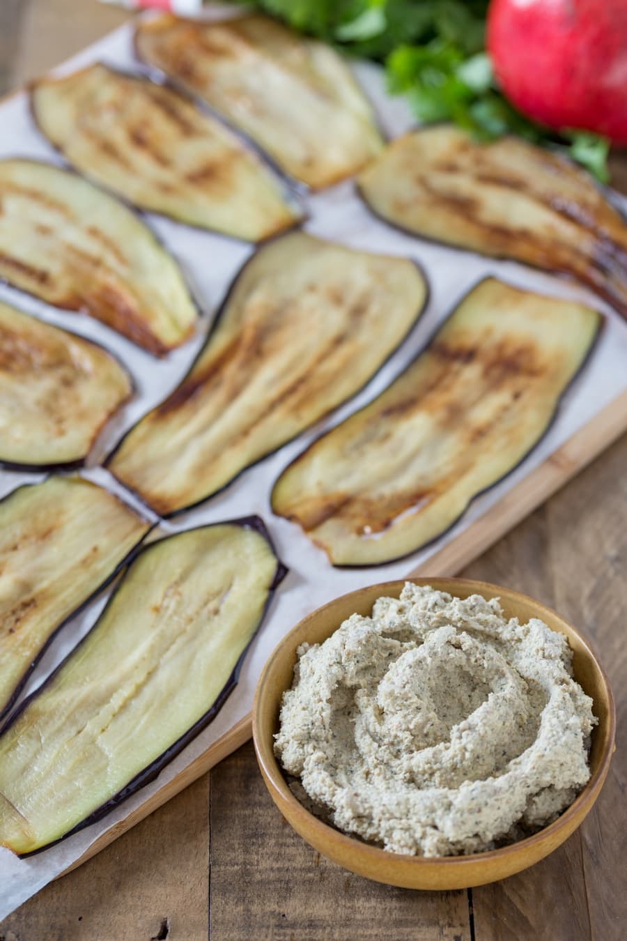 Friend eggplants and a bowl of walnut paste.