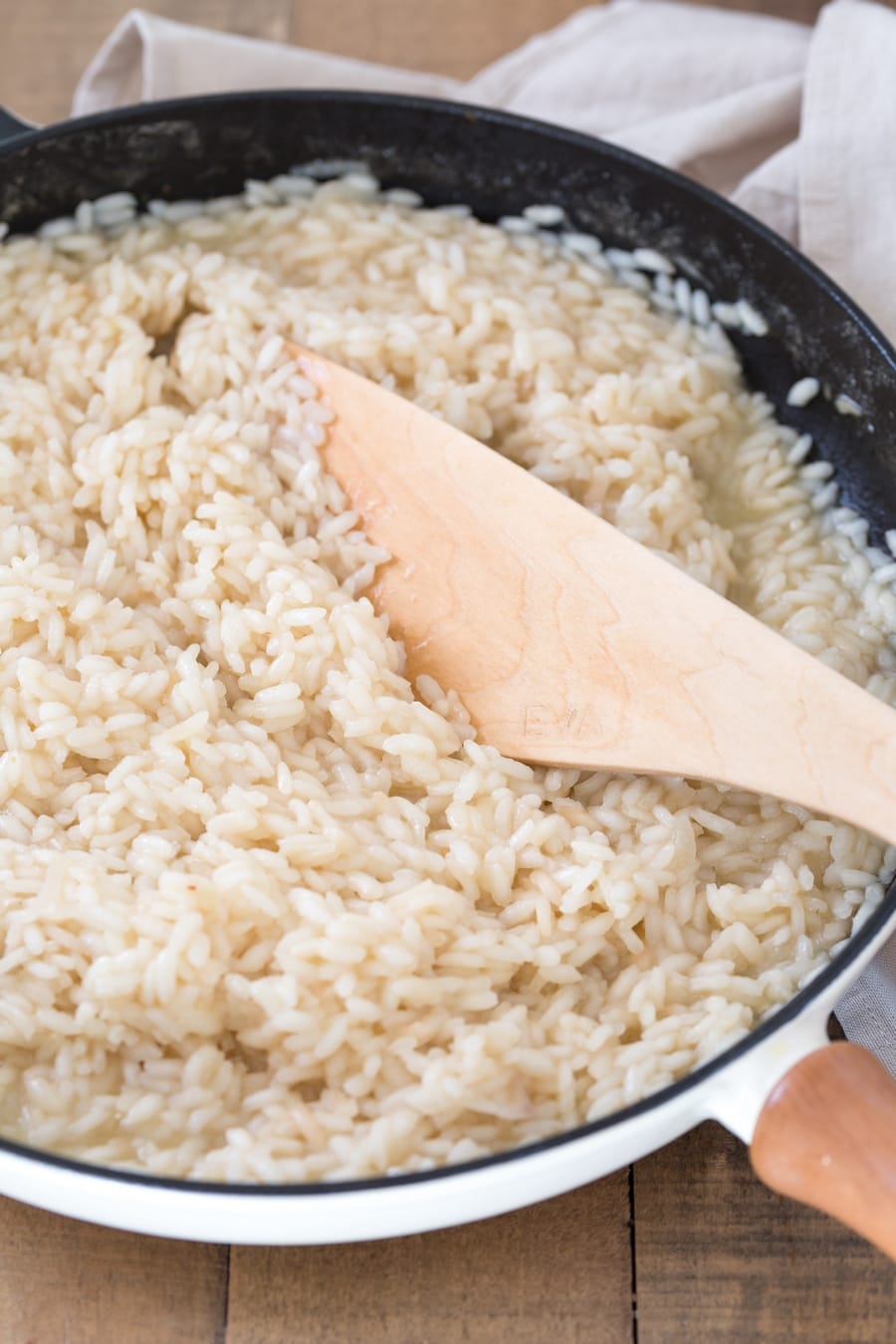 Zucchini cheddar risotto preparation: fluffy risotto that has absorbed the stock.