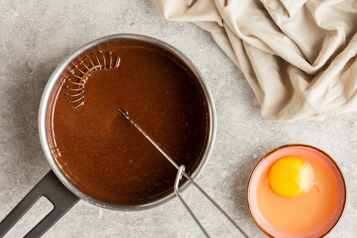 MElted chocolate in cream, egg on the side.