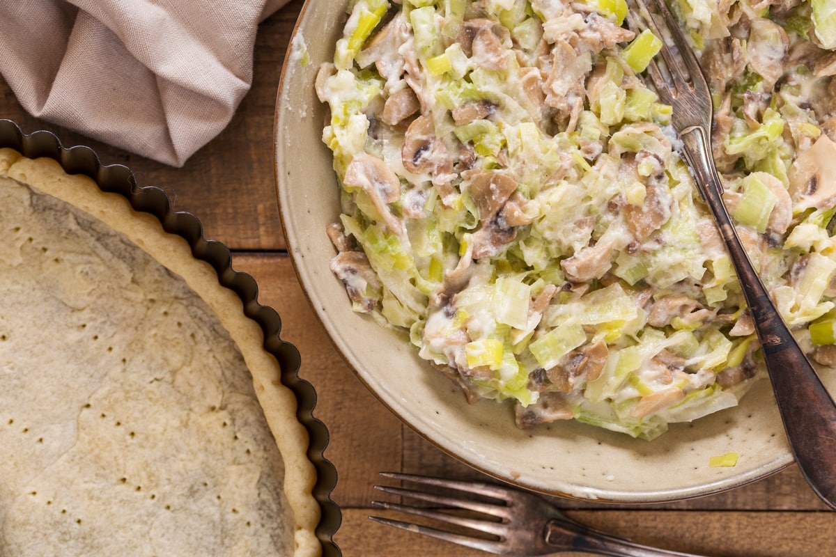 Leek mushroom pie in the making: crust and filling separated.
