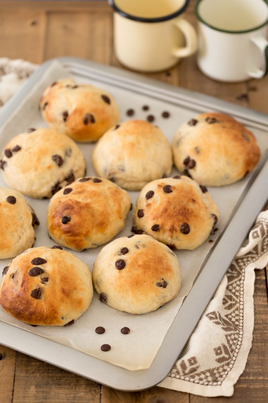 Oven tray with 9 baked yeast balls.