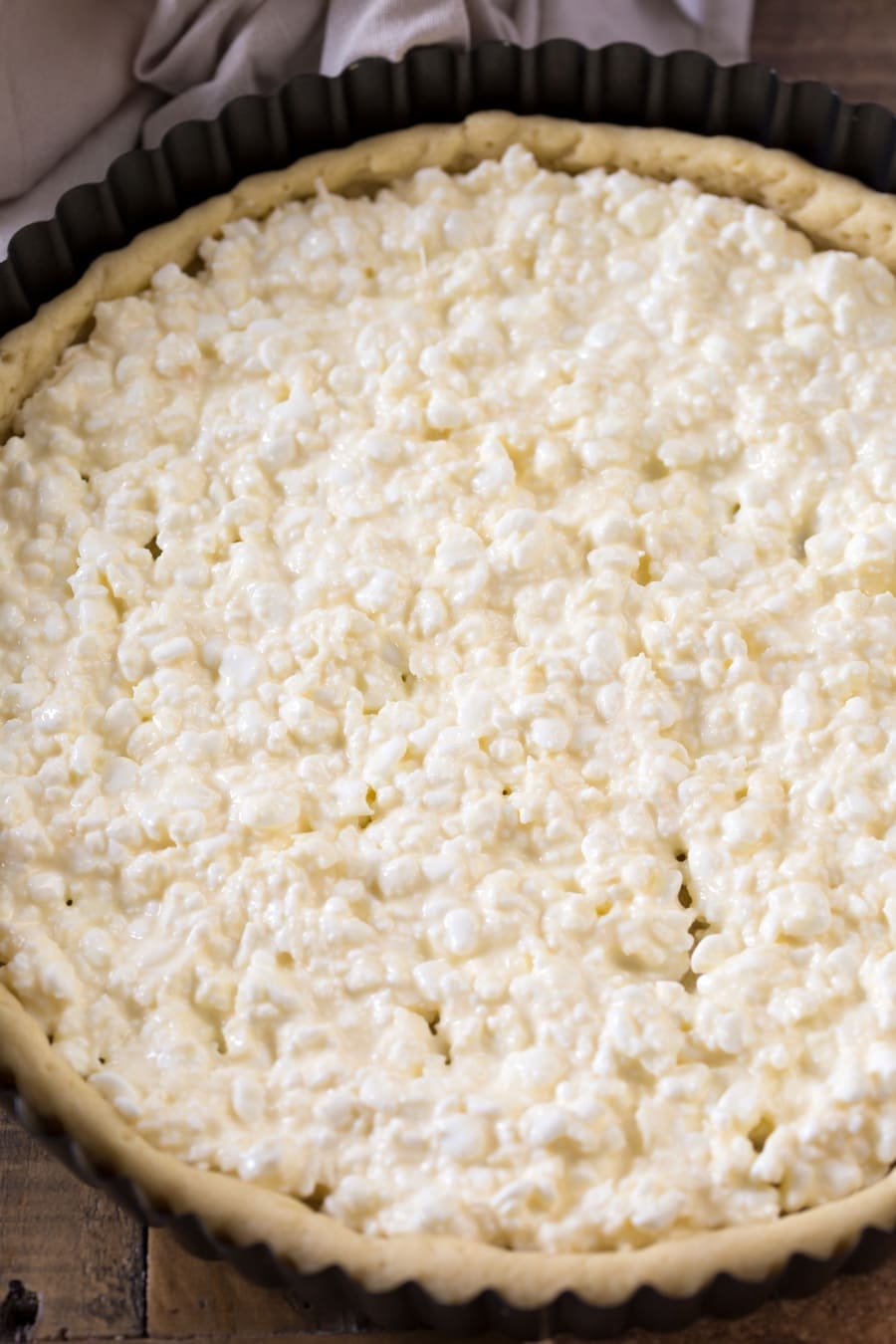 Pie crust filled with cottage cheese mixture.
