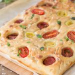 Poolish focaccia bread with cherry tomatoes.