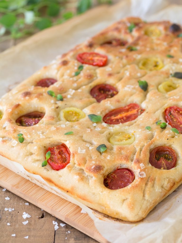 Poolish focaccia bread with cherry tomatoes.