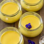 Small glass pots with saffron panna cotta.