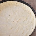 White wine shortcrust pastry pressed into tart pan.