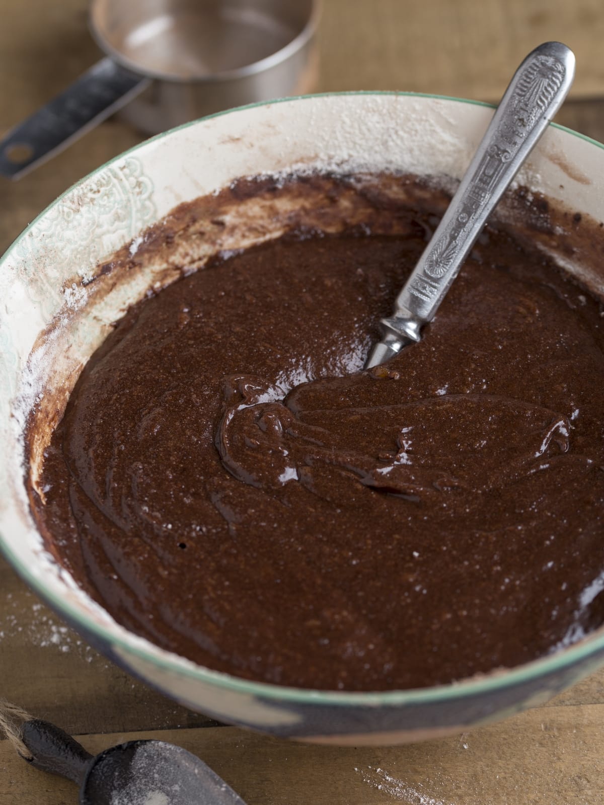Kladdkaka cake batter mixed witha fork.