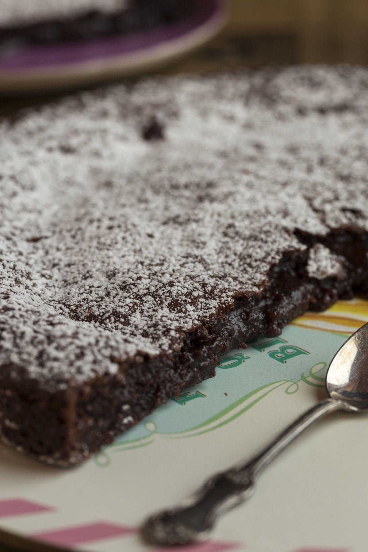 Detail of the cut showing how gooey the cake is.