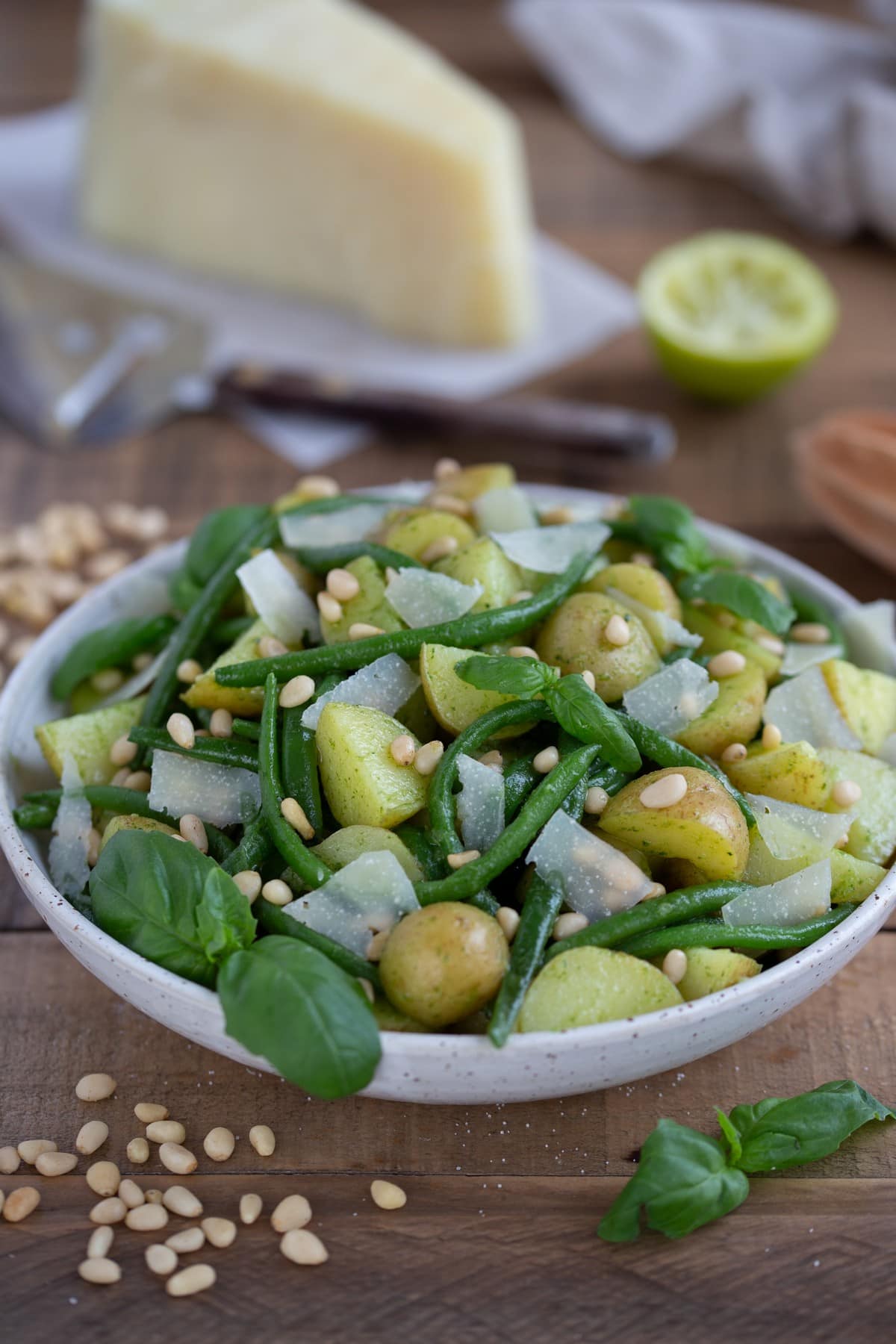 Potato salad with pesto dressing, green beans, pine nuts and pecorino flakes.