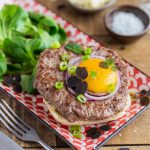 Open-faced beef patty sandwich inspired by Danish smørrebrød.