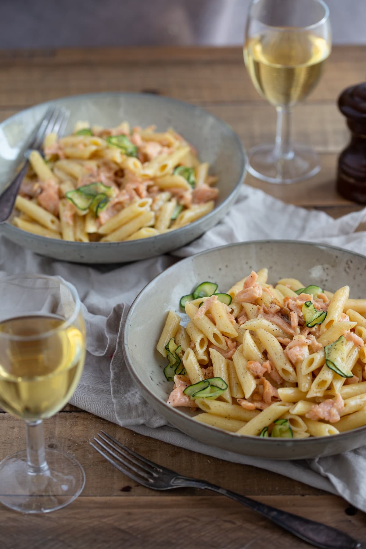 Two bowls of salmon penne alla vodka.