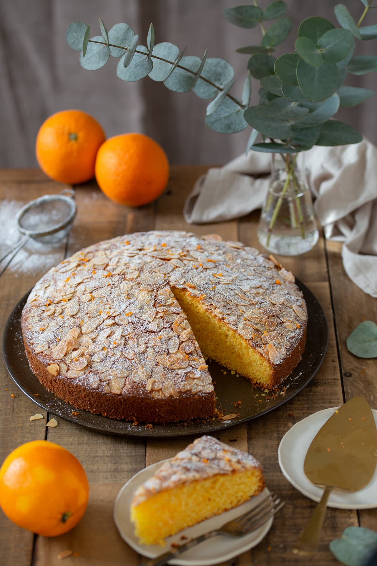 Almond carrot cake "Camilla", one slice missing.